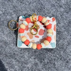 Cream colored cow wristlet/wallet set